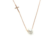 Cross with pearl necklace