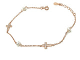 Crosses and pearls bracelet