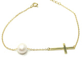 Cross with pearl bracelet